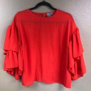 ASOS orange ruffle sleeve top.